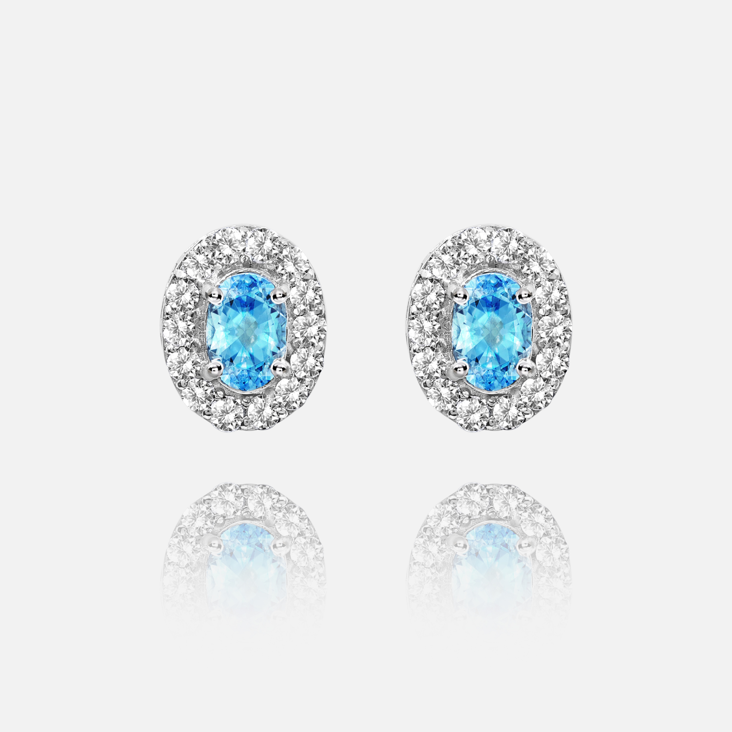 Blue Topaz 0.95 ct & Diamonds total 0.58 ct